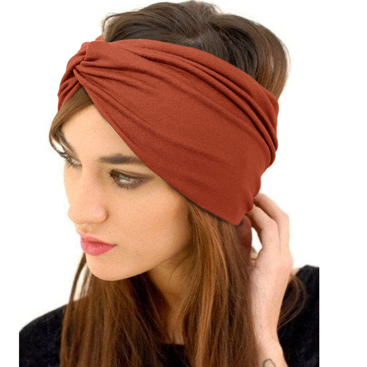 Woman wearing Jesries turban headband in a casual setting