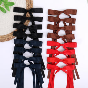 WORTL Hair Bows Clips being worn by a young girl