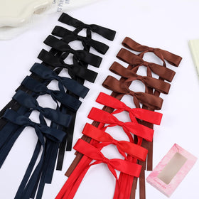 WORTL Hair Bows Clips laid out on a flat surface