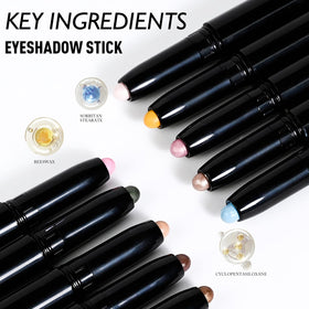 Wugbc Taupe Shimmer Eyeshadow Stick alongside makeup brushes