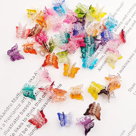 XIEHE butterfly hair clips displayed in various colours