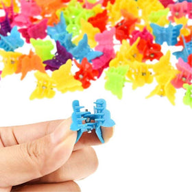 XIEHE Butterfly Hair Clips in a hand demonstrating size