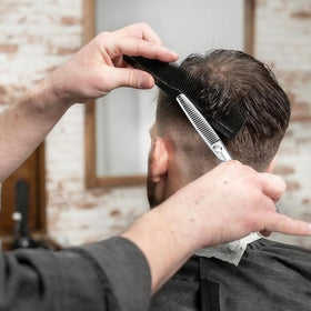 YASAKA thinning shears in use on hair during styling