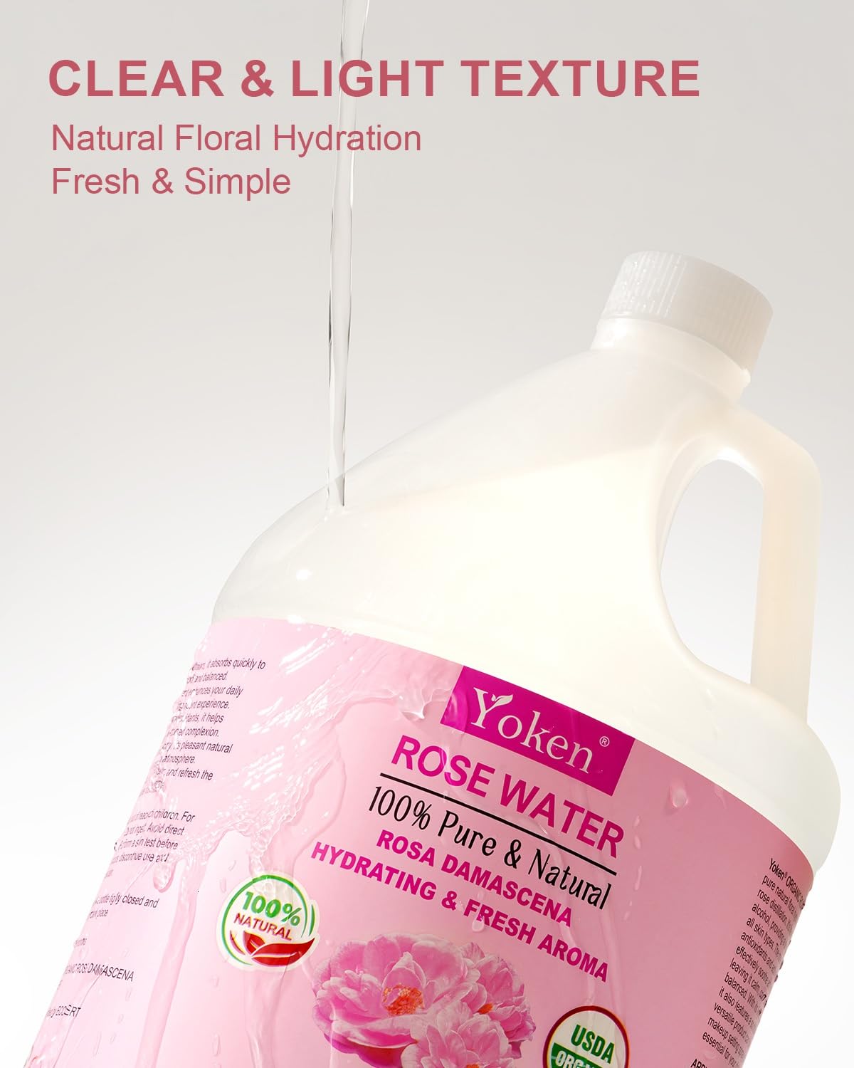 Yoken Organic Rose Water 128oz pouring into a smaller bottle