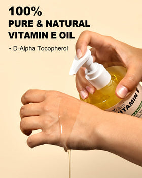 Yoken Vitamin E Oil 16 Oz with a hand applying the oil