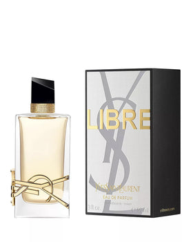 Yves Saint Laurent Libre Eau de Parfum bottle with floral background