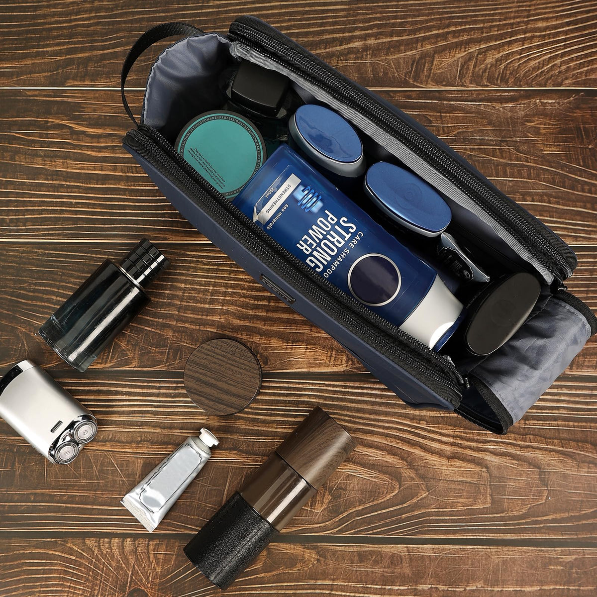 ZEEMO Travel Toiletry Bag packed in a suitcase