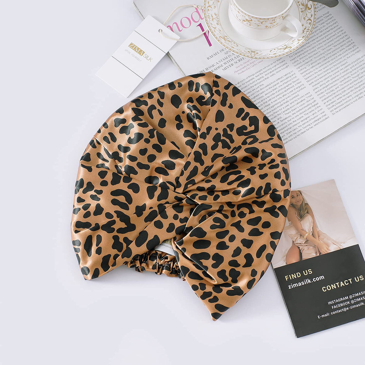 ZIMASILK Silk Bonnet displayed with hair care products