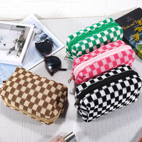 ZLFSRQ Checkered Makeup Bag set shown with a mobile phone and skincare products