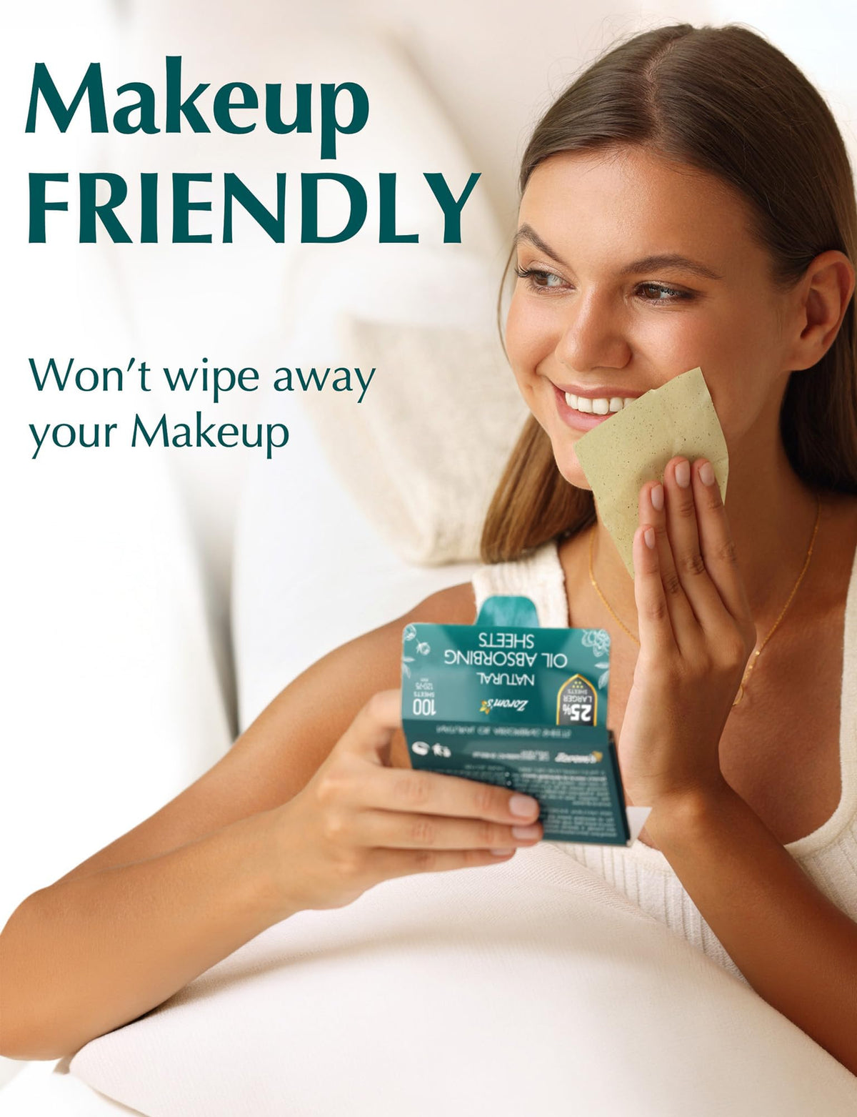 ZOROM'S XL Oil Blotting Sheets being used on a face