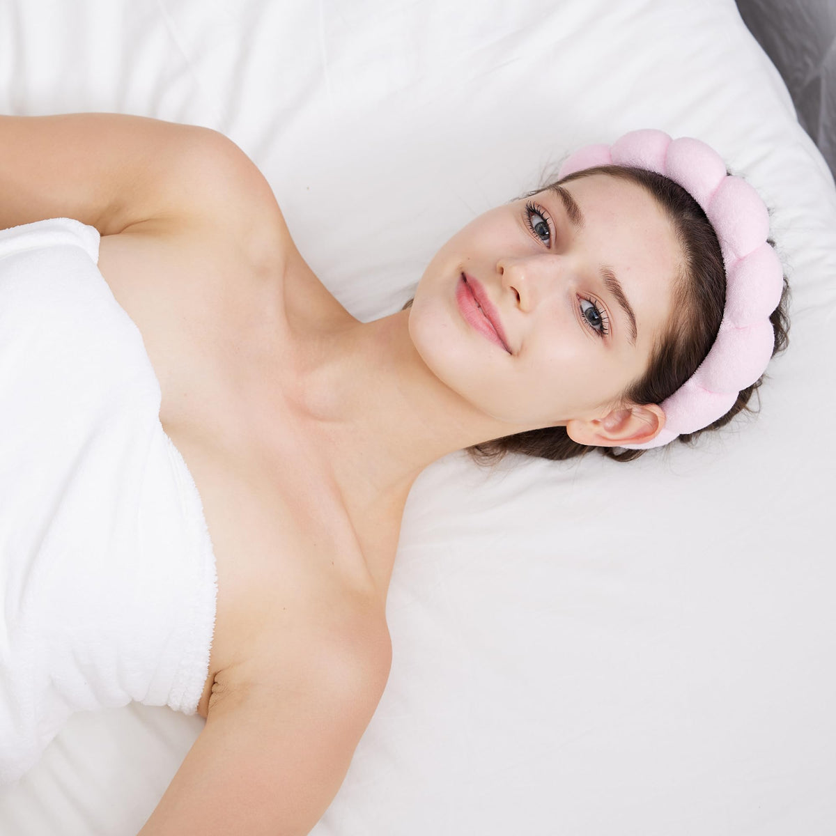 Ztomine headbands in use during a facial